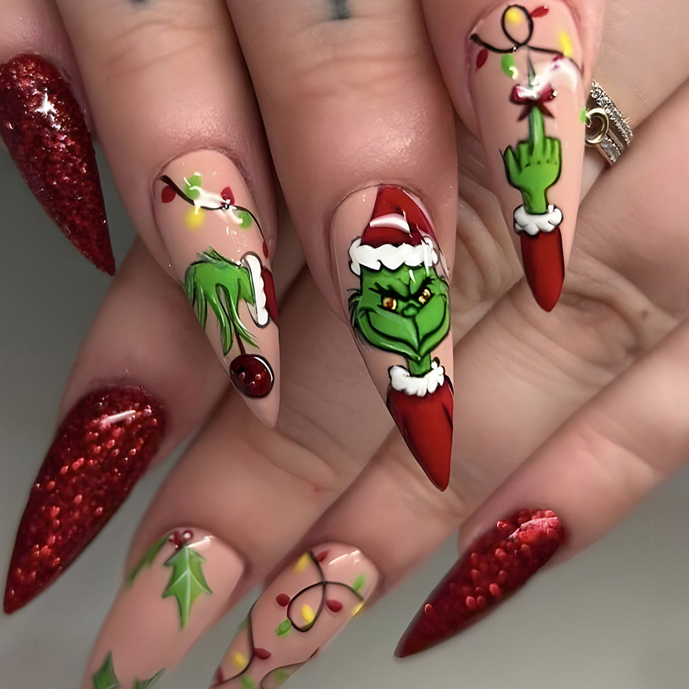 Grinch Inspired Holiday Magic Long Stiletto Red And Green Press On Nail Set With Glitter Accents And Festive Artwork