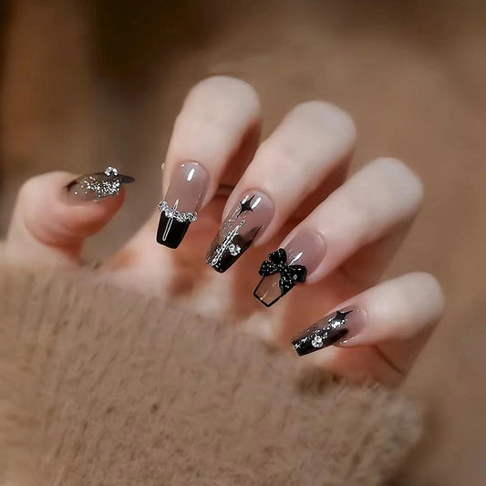 Enchanting Elegance Long Coffin Glamorous Black and Clear Nail Set with Stunning Bow Details