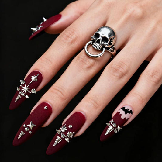 Gothic Elegance Long Almond Burgundy Matte Press On Nail Set with Skull and Spiked Accents