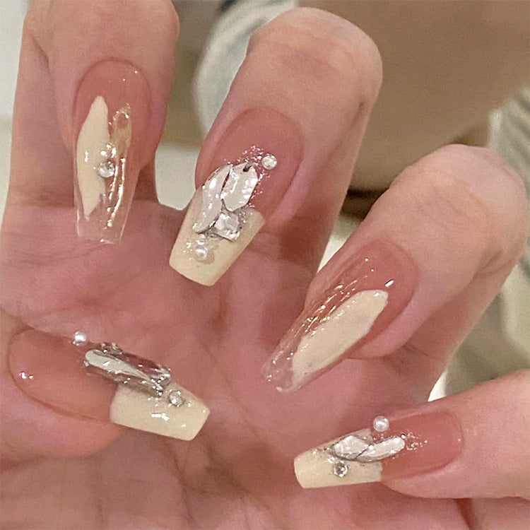 Elegant Garden Inspired Long Coffin Beige Nails with Shimmering Gem Accents