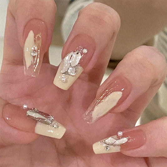 Elegant Garden Inspired Long Coffin Beige Nails with Shimmering Gem Accents