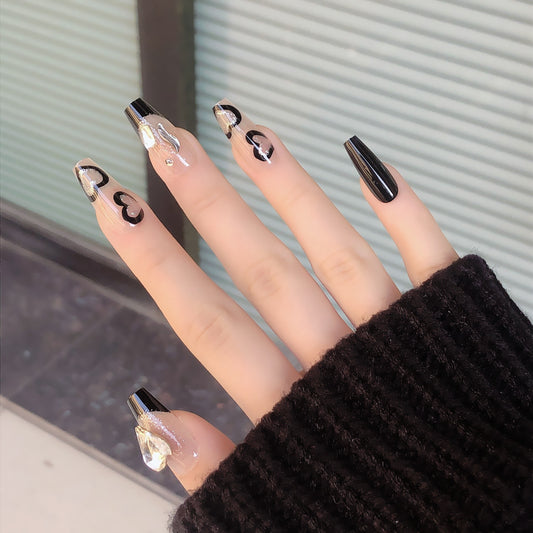 Gothic Elegance Long Coffin Black Press On Nail Set with Heart Motifs and Sparkling Accents