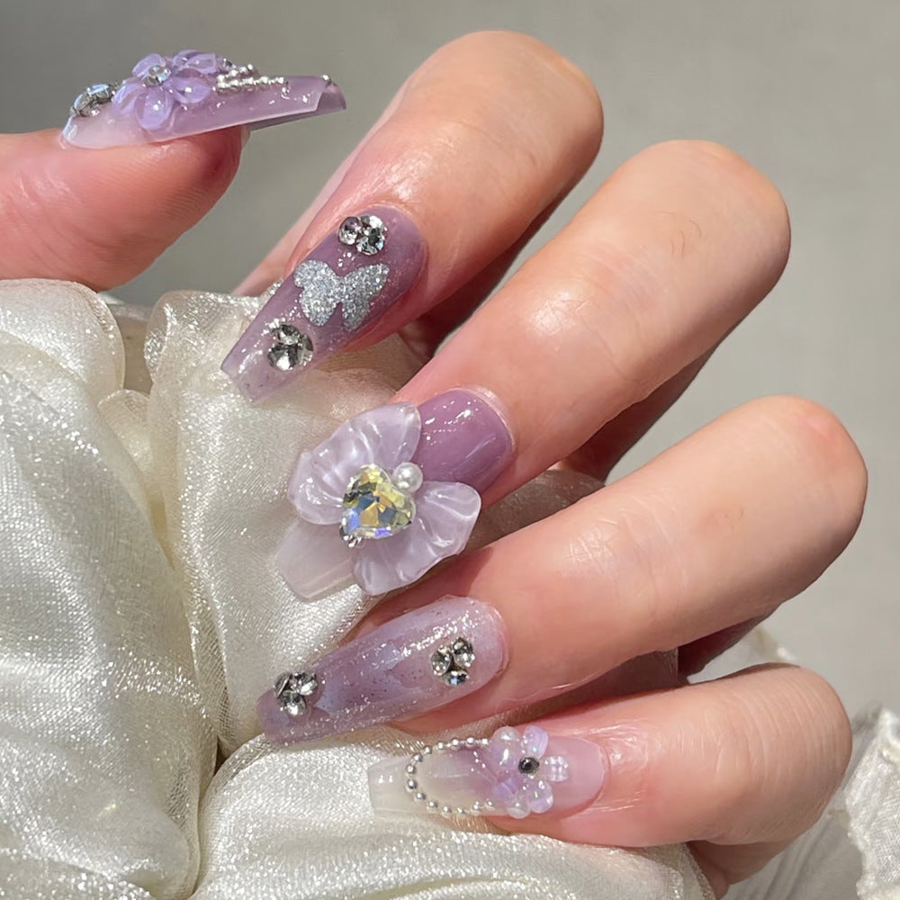 Whimsical Romance Long Coffin Lavender Press On Nail Set with Floral Embellishments and Shimmering Accents