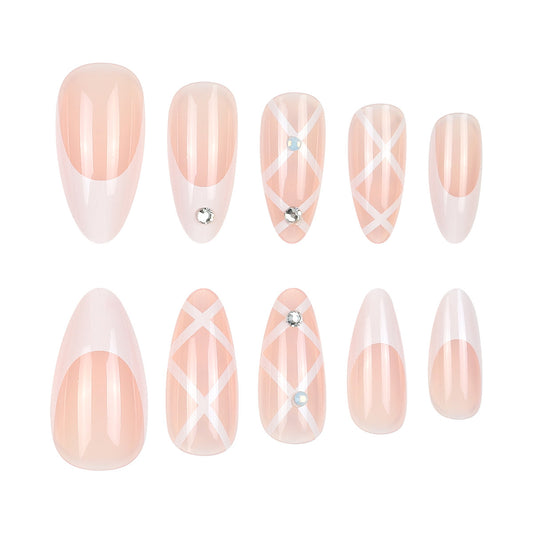 Chic Elegance Medium Almond Pink Nails with Striking Geometric Design and Rhinestone Accents