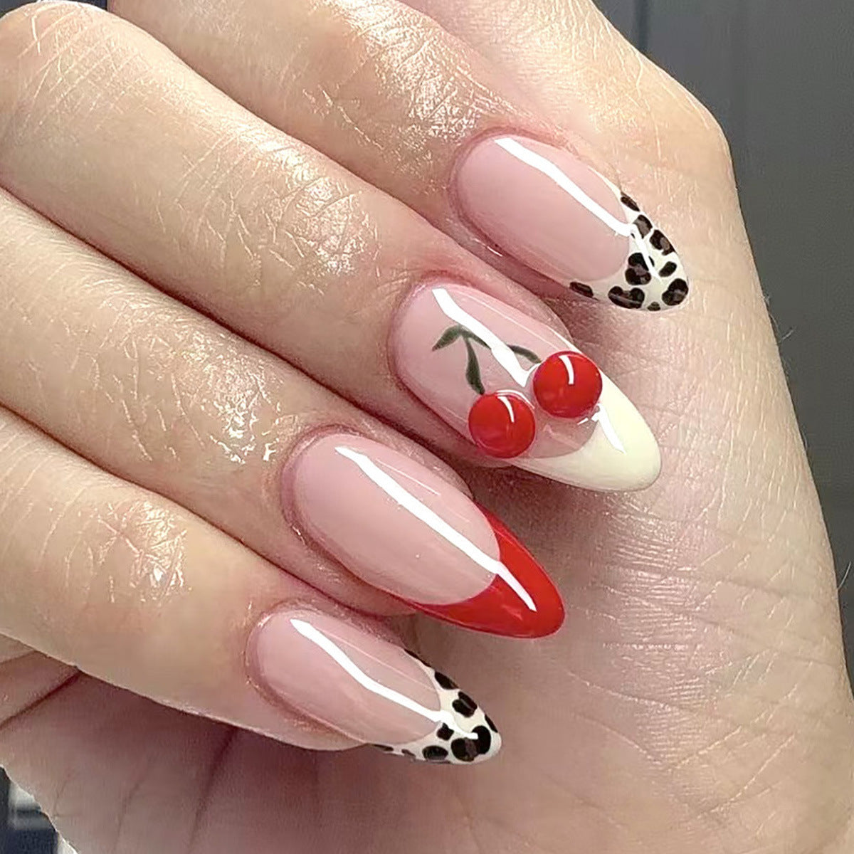 Cherry Delight Short Almond Shaped Glossy Pink and Red Animal Print Nail Set with Unique Cherry Design