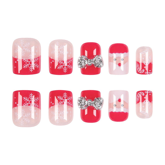Festive Wonderland Red Short Square Press on Nail Set with Snowflake Design and Sparkling Bow Accent