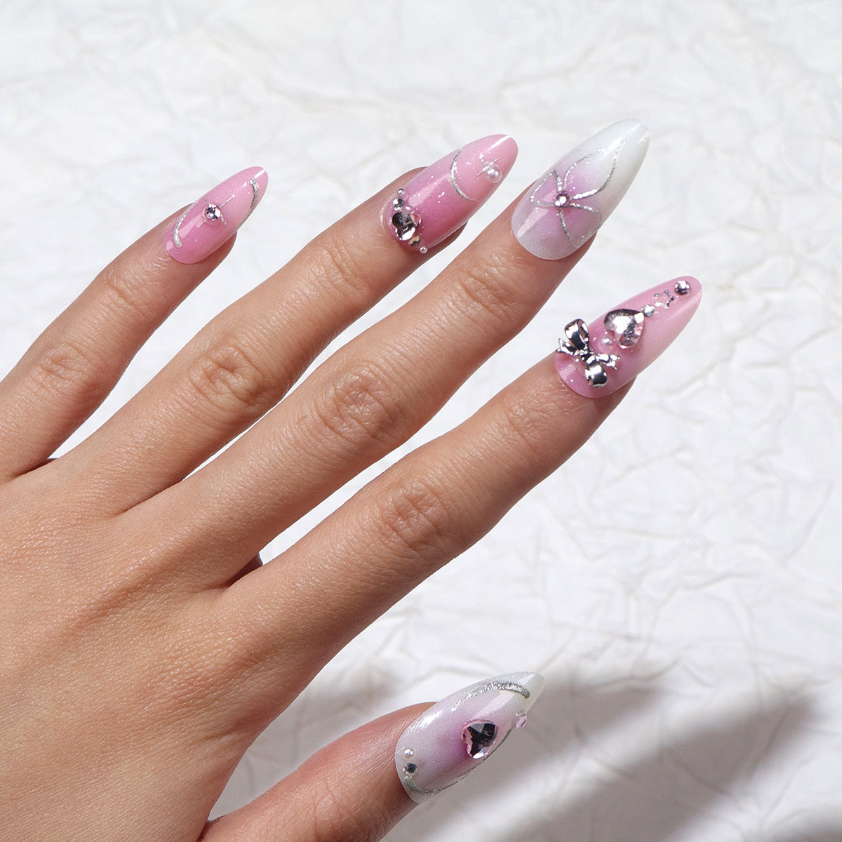 Enchanting Floral Fantasy Medium Almond Pink and White Press On Nail Set with Shimmering Gemstone Accents