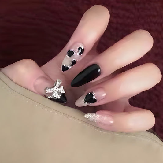 Glamorous Heartfelt Elegance Medium Almond Black and Silver Glitter Press on Nail Set with Radiant Bow Charm