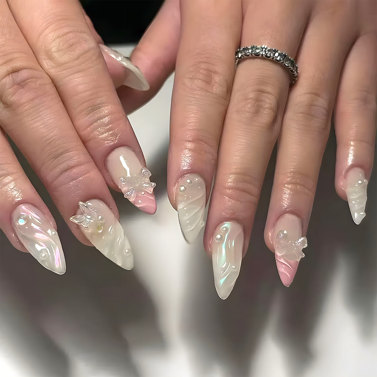 Celestial Elegance Medium Almond Press On Nail Set Iridescent White and Soft Pink with Floral Embellishments