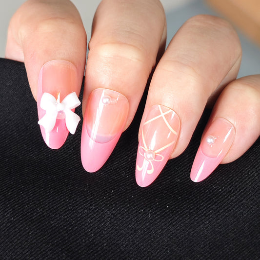 Charming Elegance Medium Almond Pink Press-On Nail Set with Whimsical Bow Accents