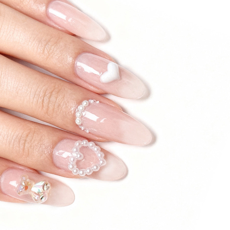 Love Story Radiant Long Almond Pink Press On Nail Set with Charming Heart and Pearl Accents