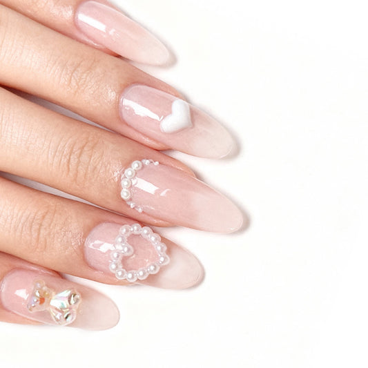 Love Story Radiant Long Almond Pink Press On Nail Set with Charming Heart and Pearl Accents