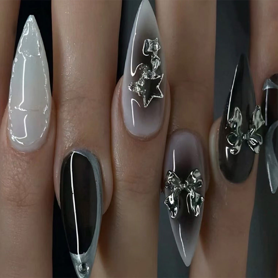Mystical Enchantment Long Stiletto Shape Glossy White and Black Ombre Finish with Unique Metallic Bow Accents Nail Set