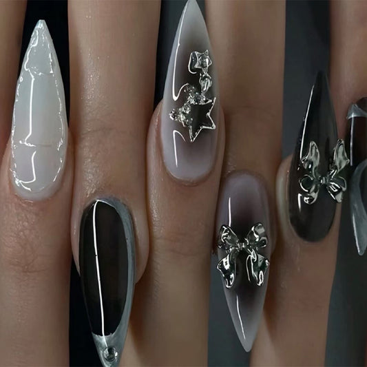 Mystical Enchantment Long Stiletto Shape Glossy White and Black Ombre Finish with Unique Metallic Bow Accents Nail Set