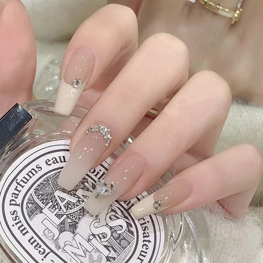 Glamorous Elegance Long Coffin Beige Gradient Nails with Stunning Rhinestone Accents