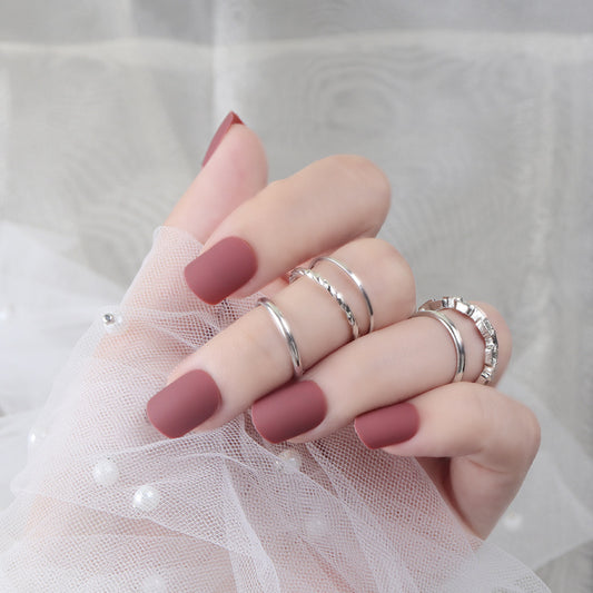 Elegant Rose Matte Oval Press On Nails Medium Burgundy with Unique Texture Detail
