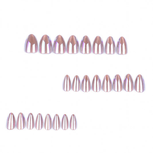 Set of rose gold nail extensions on a white background