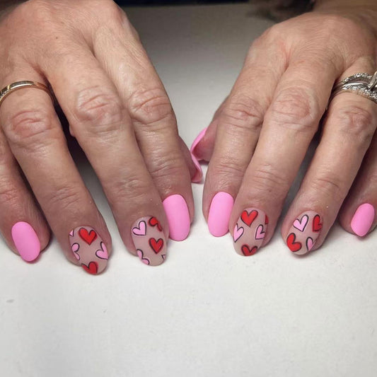 Romantic Bliss Charming Short Squoval Pink Nail Set with Heart Pattern Design