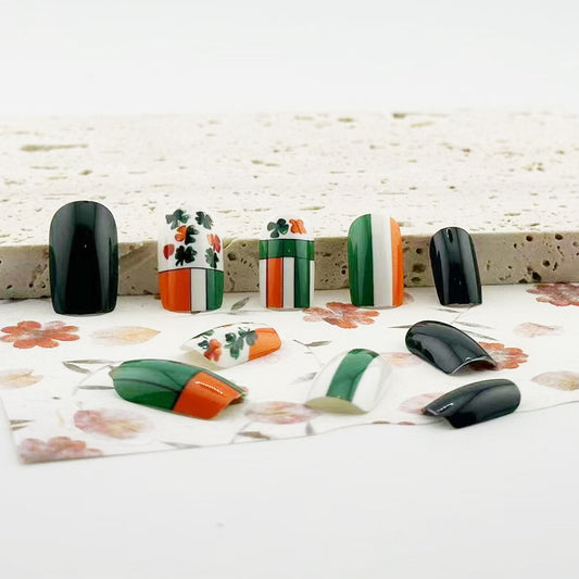 Lively Irish Celebration Medium Square Black Green and Orange Press on Nail Set with Festive Shamrock Design