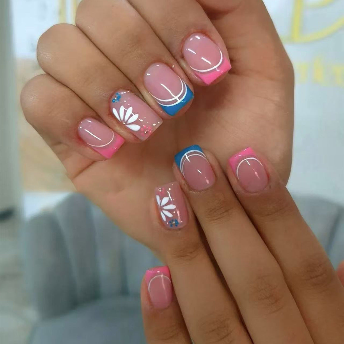 Joyful Garden Short Square Press On Nail Set with Pastel Pink and Blue Ombre and Charming Floral Design