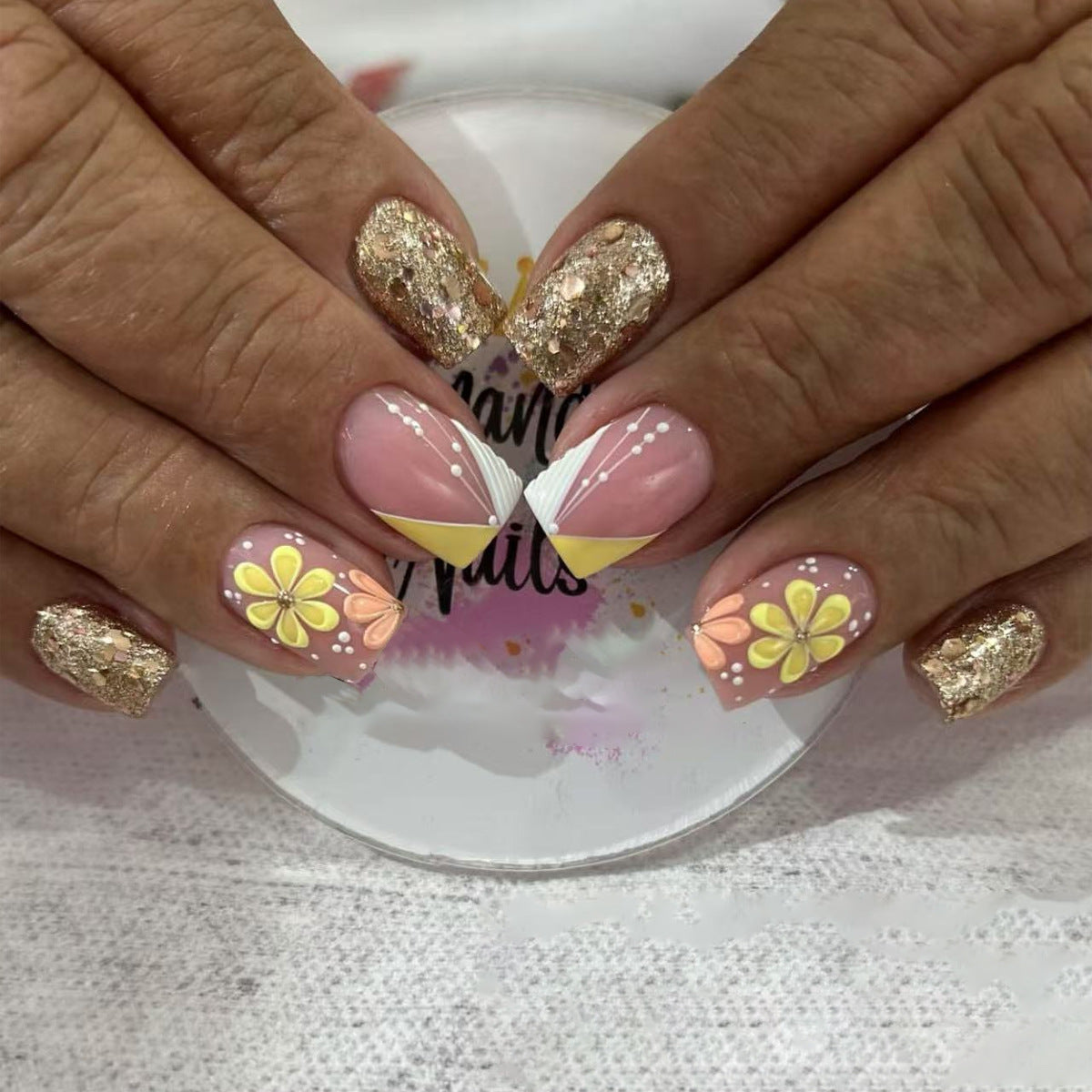 Blossom Elegance Short Square Pink and Gold Glitter Floral Press On Nail Set with Unique Design Accents
