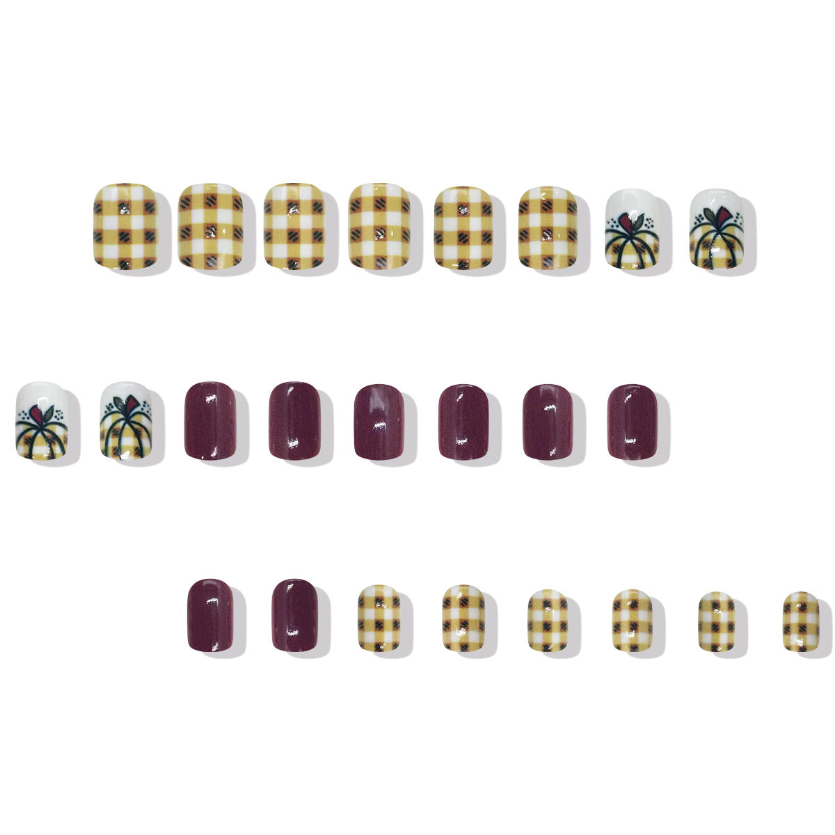 Set of nail art designs with plaid and leaf patterns on a white background
