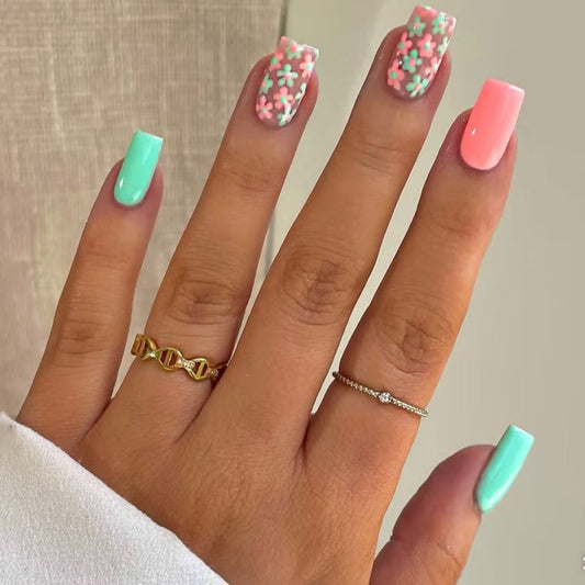 Charming Floral Oasis Medium Square Mint Green and Coral Press On Nail Set with Unique Floral Accents