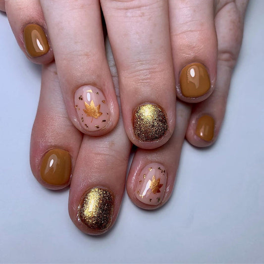 Elegant Autumn Vibes Short Oval Brown and Gold Press on Nail Set with Leaf Accent Design