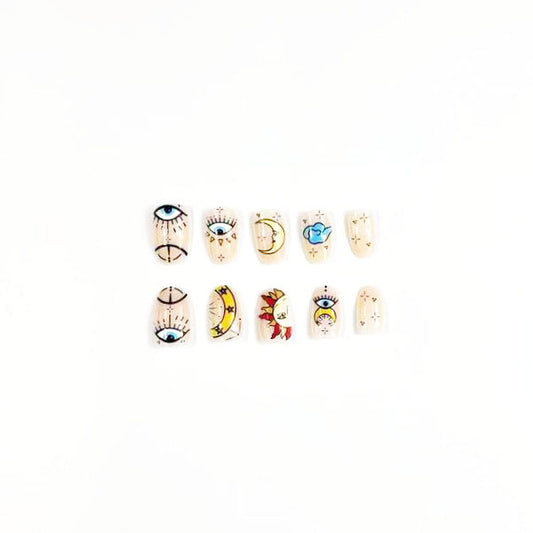 Celestial Dreams Long Almond Natural Beige Press On Nail Set with Whimsical Eyes and Sun Designs
