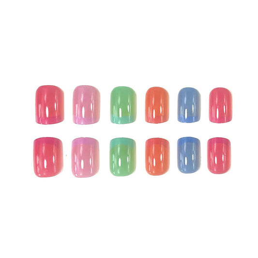 Set of colorful nail polish samples on a white background