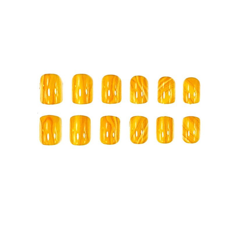 Sunny Delight Short Oval Yellow Press On Nail Set with Unique Swirl Design