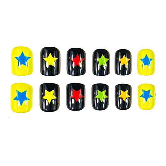 A set of false nails with a vibrant yellow, black, and colorful star design.