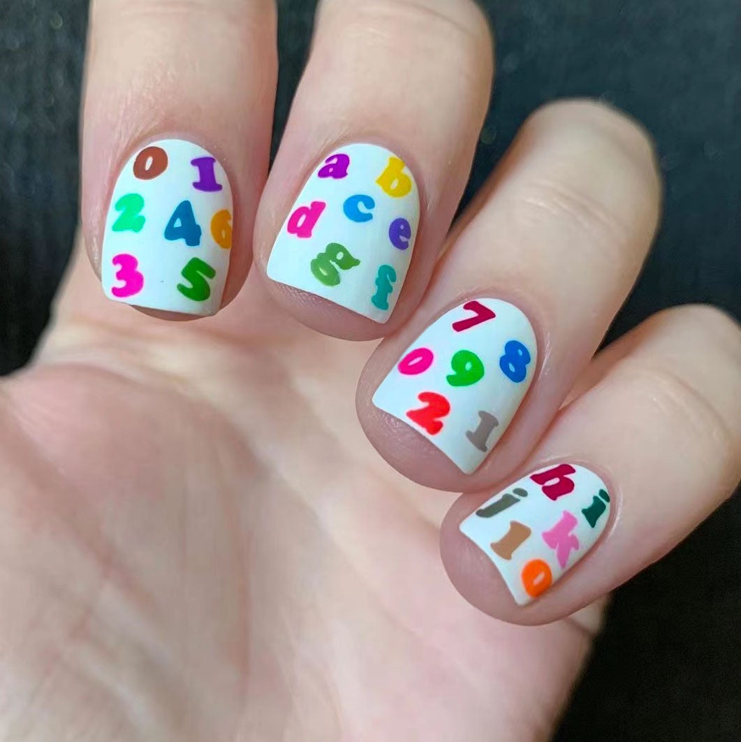 Colorful Alphabet Playful Medium Square Press On Nail Set with Multicolored Numbers and Letters on White Background