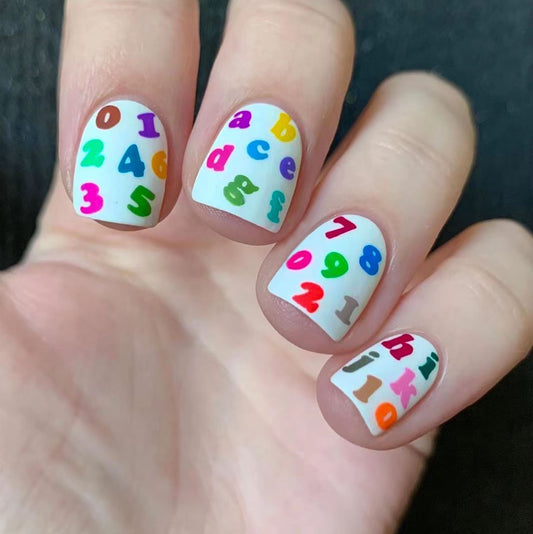 Colorful Alphabet Playful Medium Square Press On Nail Set with Multicolored Numbers and Letters on White Background
