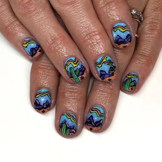Desert Vibes Short Oval Blue Press On Nail Set with Vibrant Cactus and Mountain Art
