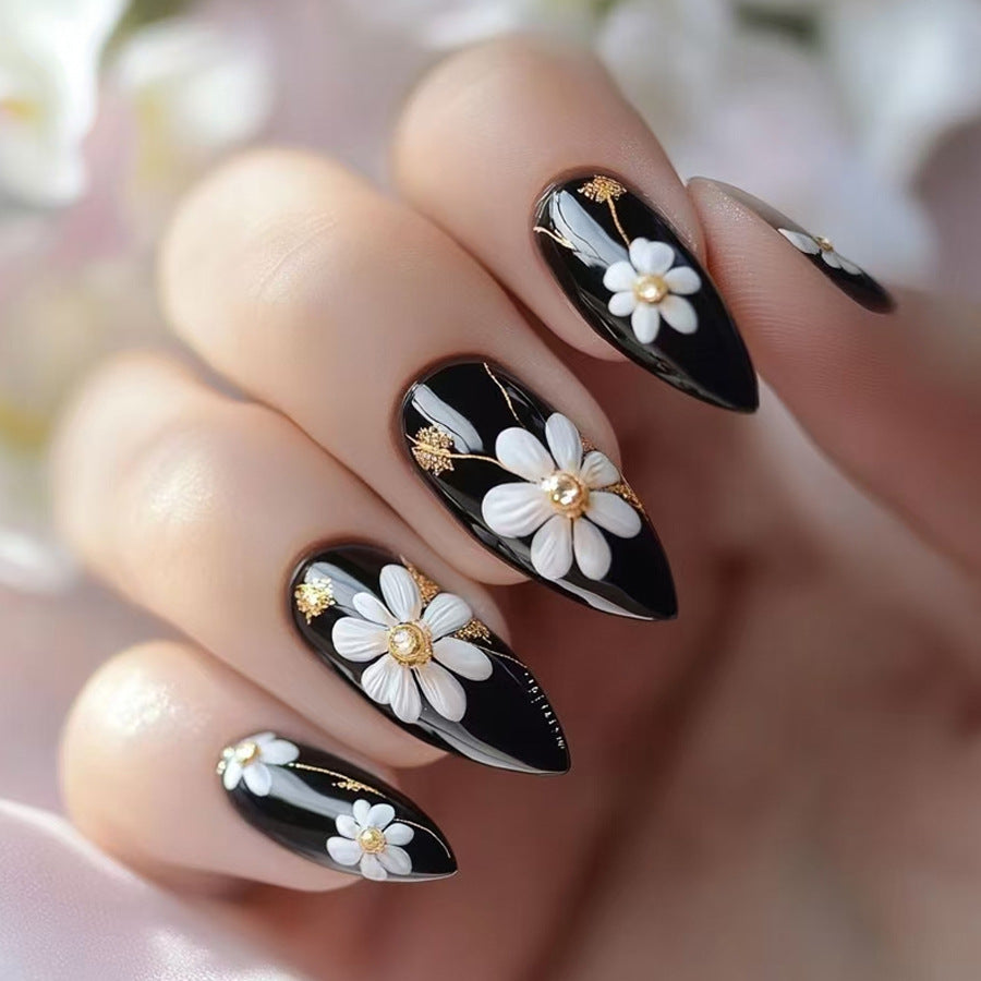 Elegant Floral Fantasy Medium Stiletto Black Press On Nail Set with Stunning White Flower Accents