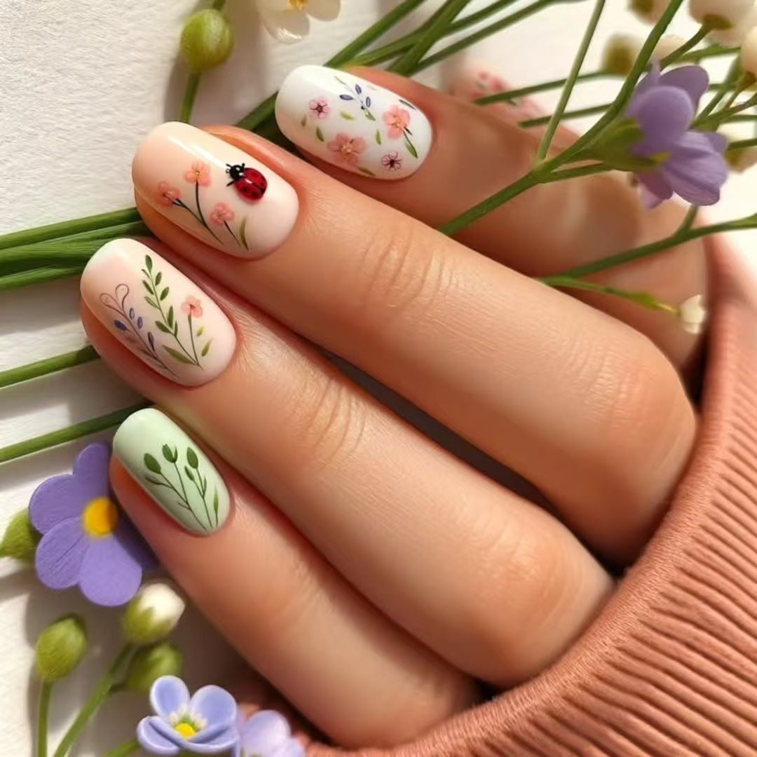 Charming Garden Inspired Short Oval White and Green Floral Design with Ladybug Press On Nail Set
