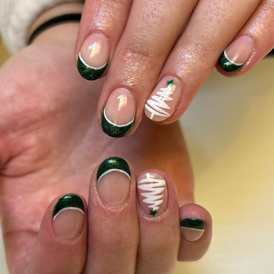 Holiday Cheer Green Short Oval Press On Nail Set with Glittery Tips and Festive Tree Design