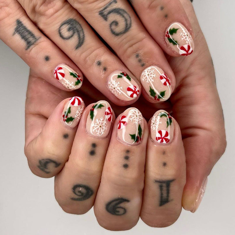 Holiday Cheer Short Almond Red White Candy Cane Christmas Press On Nail Set with Festive Snowflakes and Holly Design