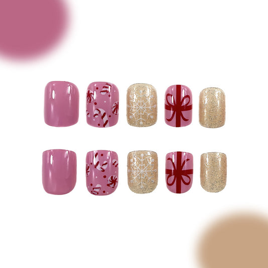 Holiday Joy Press On Nail Set 10 Short Oval Pink Red and Gold Glitter with Festive Candy and Gift Designs