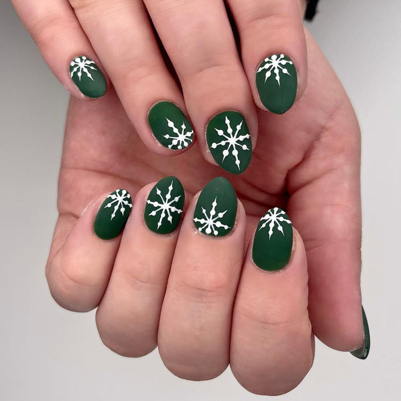 Winter Wonderland Oval Medium Green Press On Nail Set with White Snowflake Design