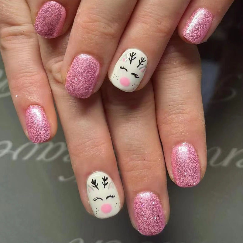 Festive Winter Wonderland Medium Oval Shimmering Pink Glitter and Cute Reindeer Design Press On Nail Set