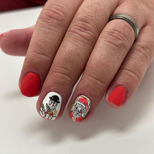 Festive Cheer Short Oval Red Press On Nail Set with Unique Holiday Character Designs