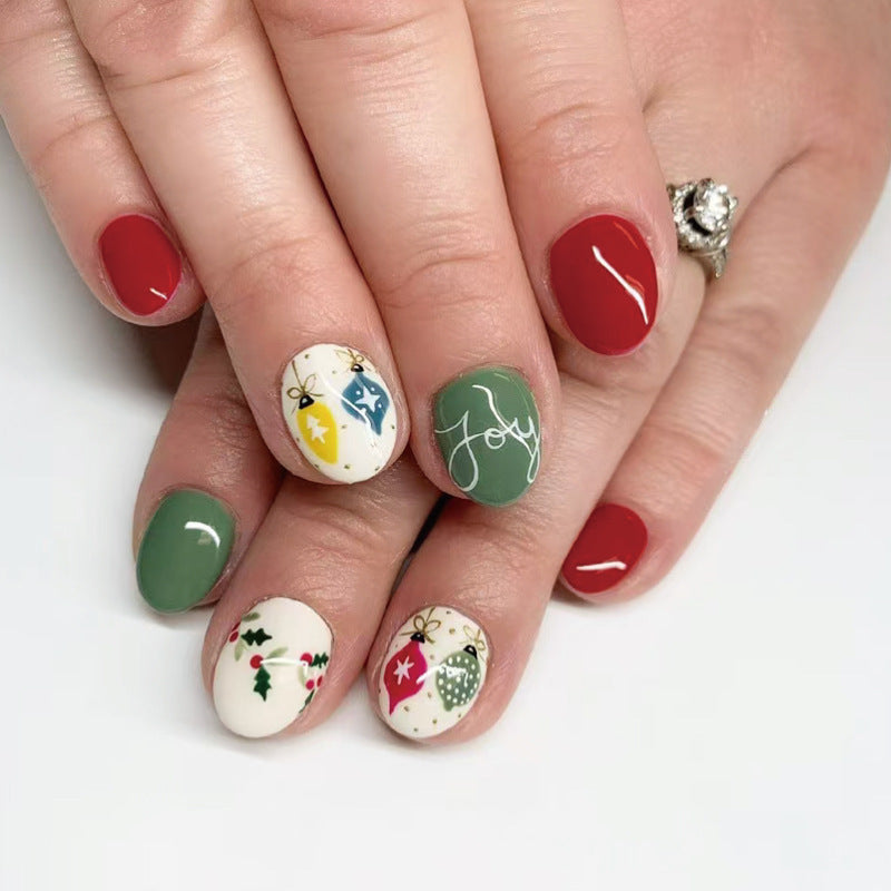 Holiday Cheer Oval Short Red and Green Festive Press On Nail Set with Joyful Ornament Designs