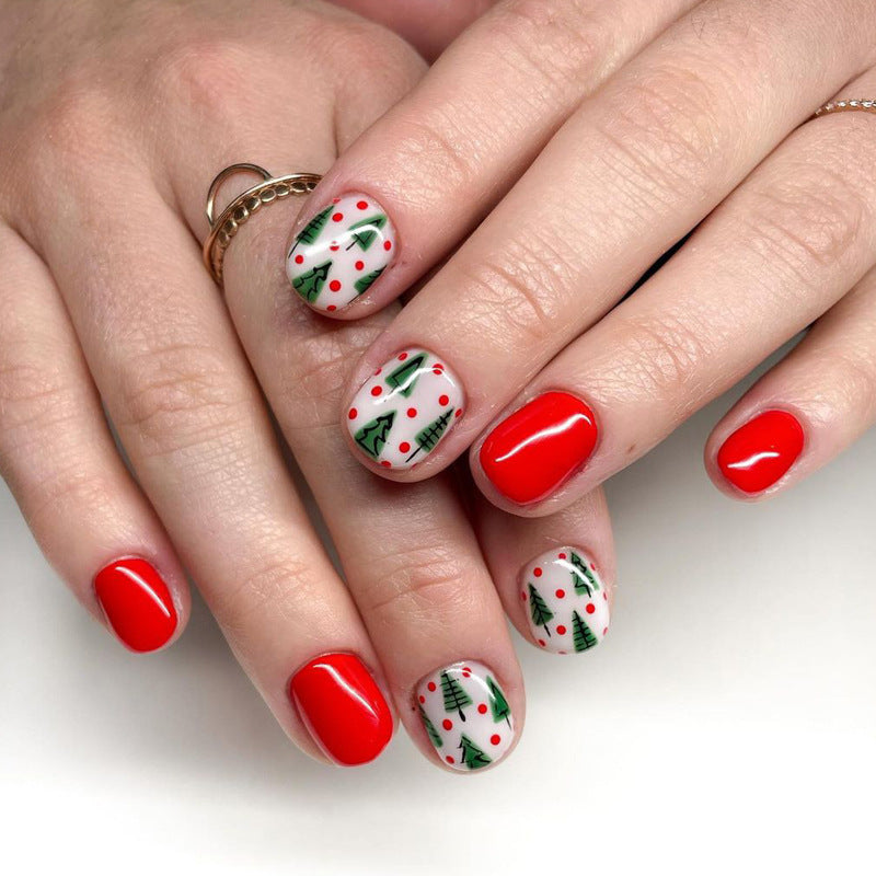 Festive Holiday Cheer Short Oval Red and White Christmas Tree Press On Nail Set with Glossy Finish