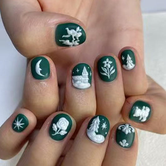 Whimsical Forest Green Short Oval Press On Nail Set with Intricate White Designs