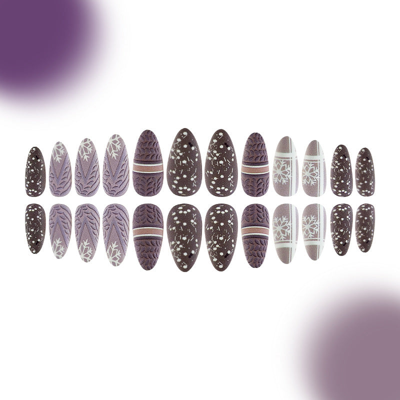 Set of decorative nail art stickers with various patterns on a white background