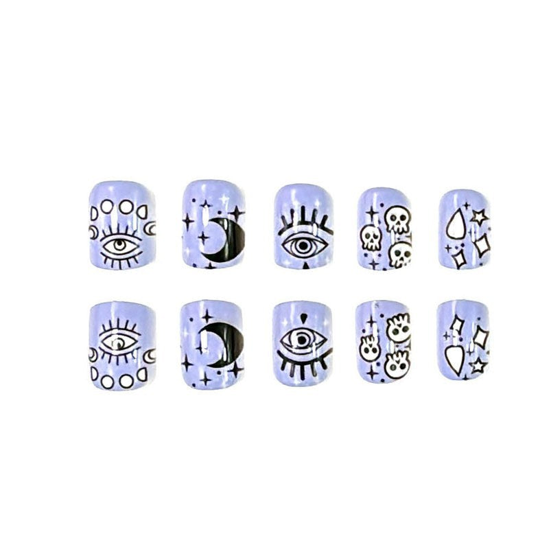 Mystical Night Sky Medium Oval Light Blue Press On Nail Set with Celestial Eye and Skull Designs
