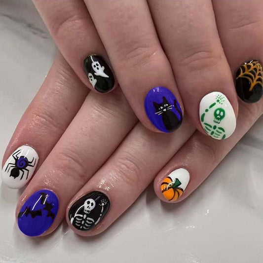 Spooktacular Short Oval Purple and Black Halloween Press On Nail Set with Fun Skeleton and Ghost Designs