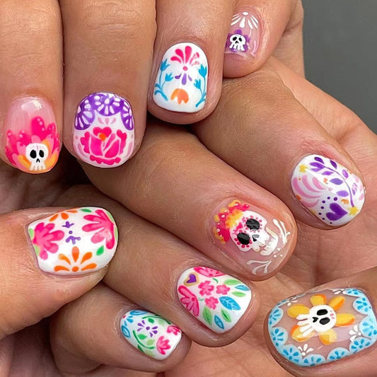 Colorful Floral Fiesta Short Oval Press On Nail Set with Artistic Sugar Skull Designs